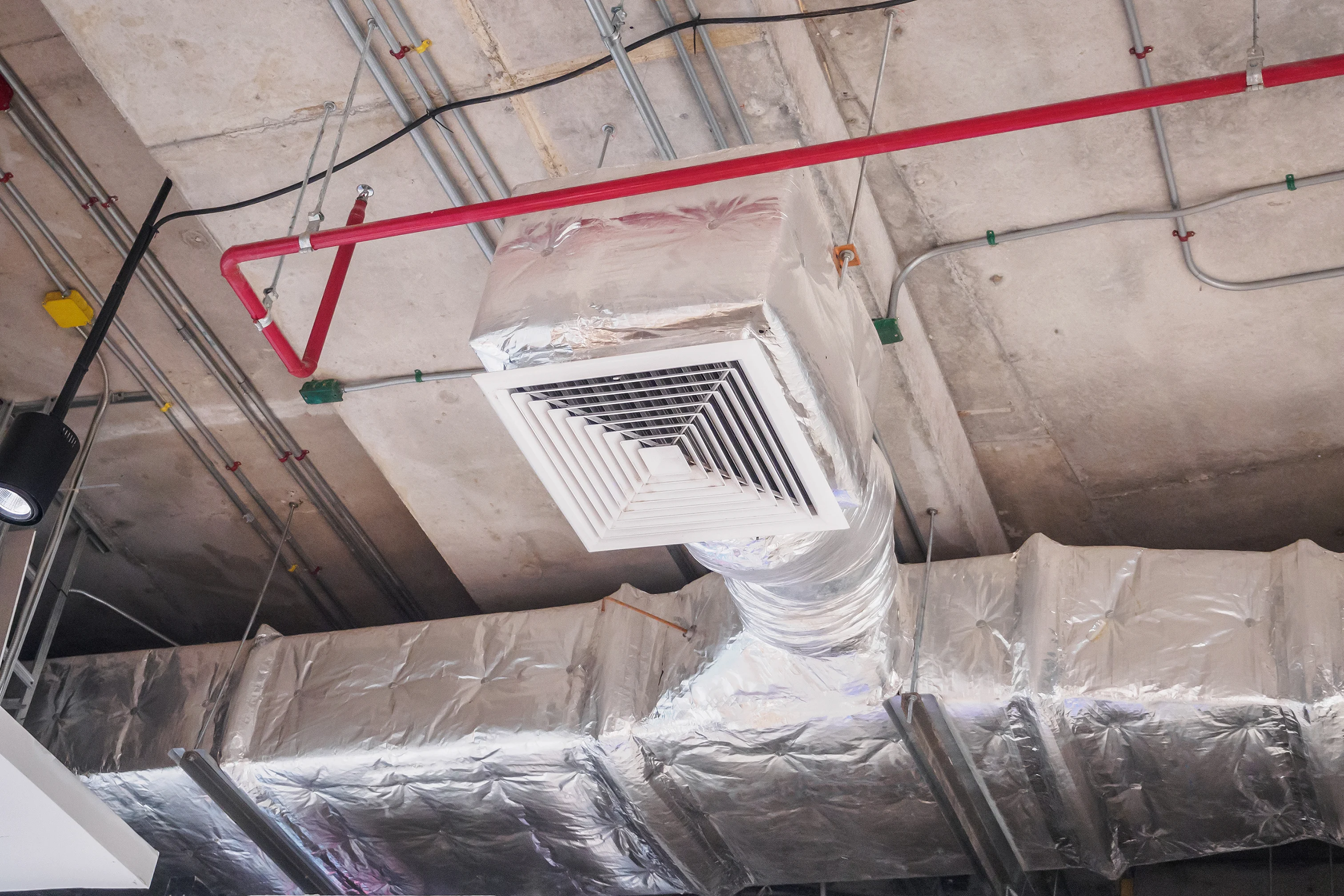 Air Dynamics of Tulsa technician evaluating airflow for ductwork repair.